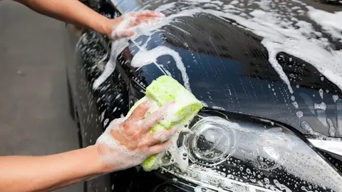 A car being hand washed